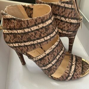 Gently used snake print high  heels